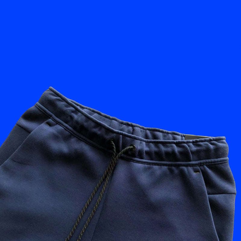 CALÇA NIKE TECH FLEECE “AZUL MARINHO”