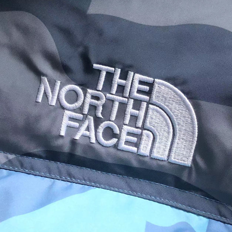 XX KAWS X THE NORTH FACE RETRO 1996 NUPTSE JACKET