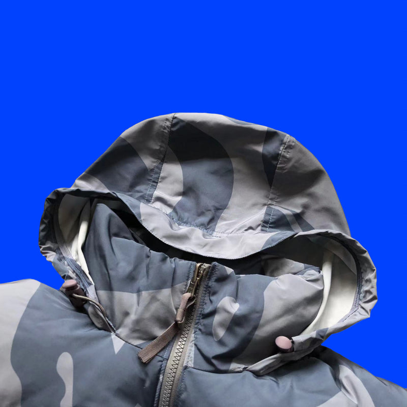 XX KAWS X THE NORTH FACE RETRO 1996 NUPTSE JACKET