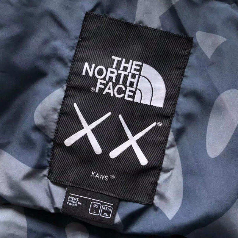 XX KAWS X THE NORTH FACE RETRO 1996 NUPTSE JACKET